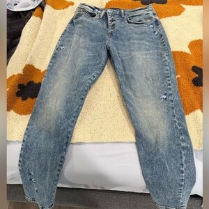 Lucky brand mid rise skinny jeans. Size 10. Blue flower detailing. Like new.